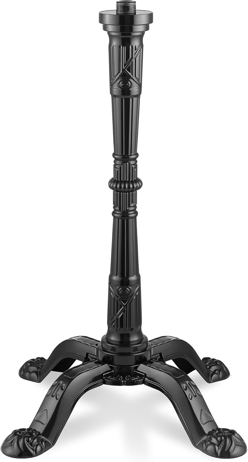 A black metal gumball machine stand with ornate scrollwork and four curved legs ending in claw-like feet, shown on a white background.