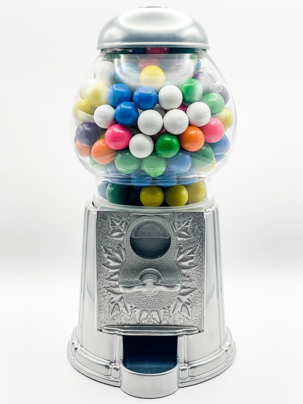 A vintage-style chrome gumball machine filled with assorted colorful bubble gum balls, photographed against a clean white studio background.
